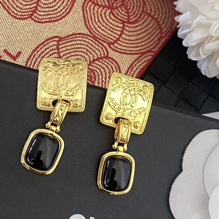 Martin Graham stud earrings in polished metal-tone – main product view