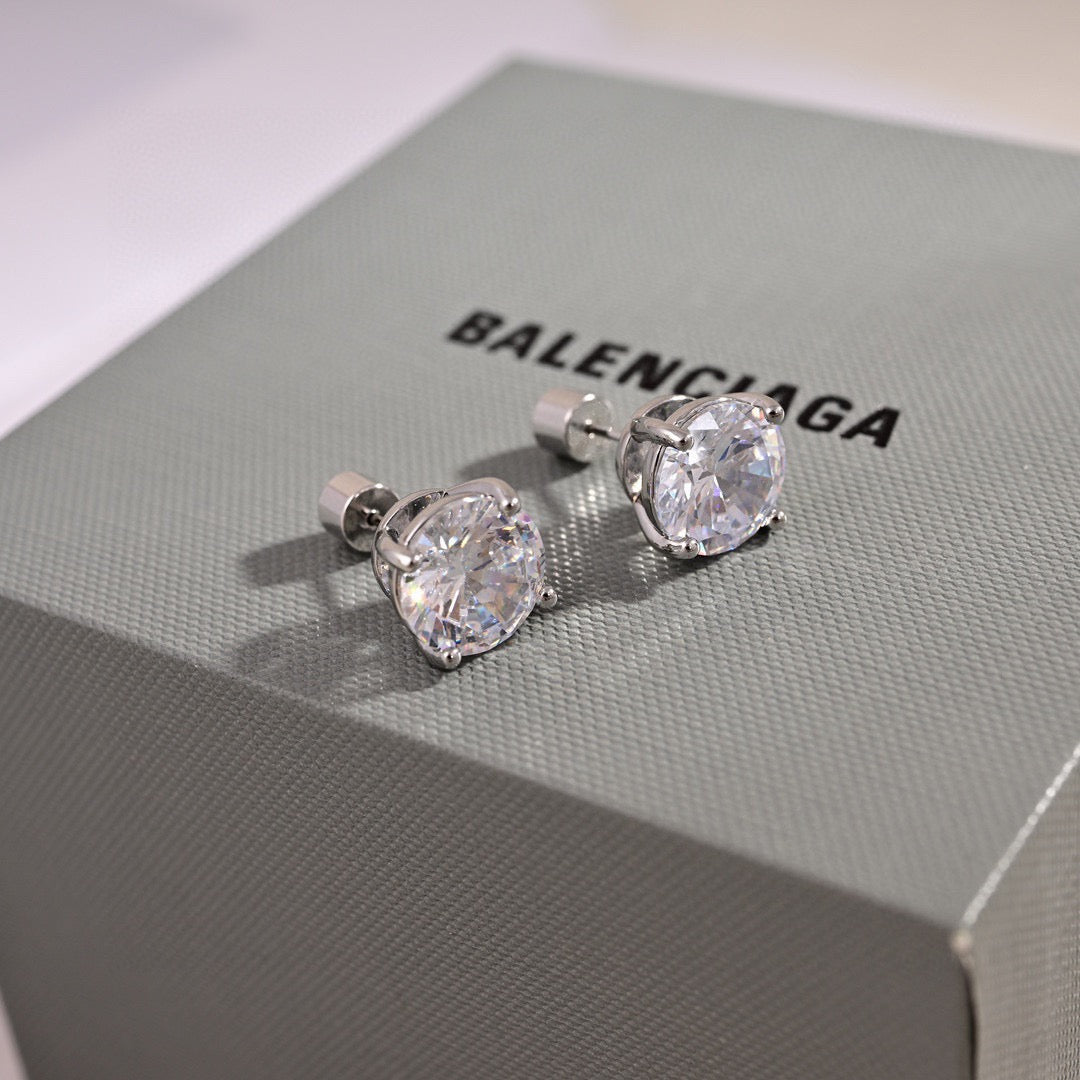 Martin Graham stud earrings in polished metal-tone – main product view