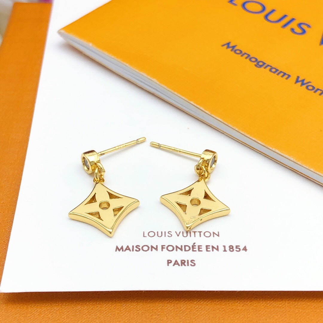 Martin Graham stud earrings in polished metal-tone – main product view