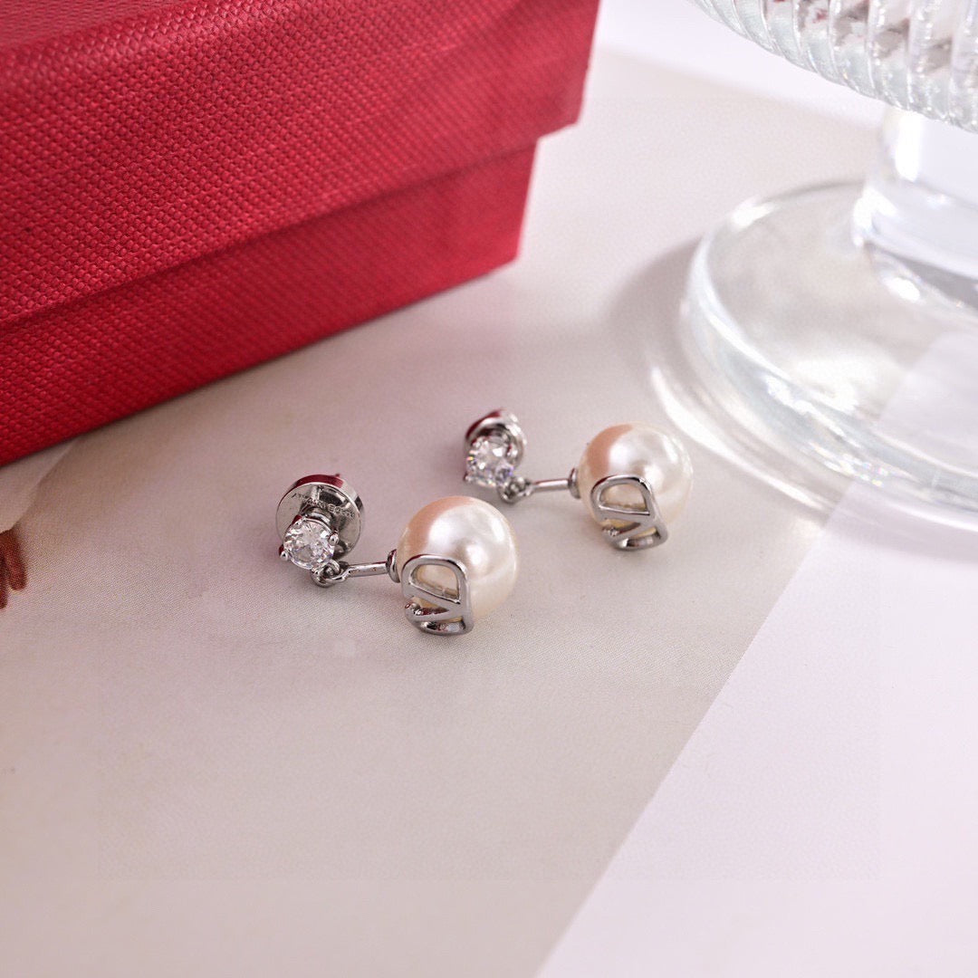 Martin Graham stud earrings in polished metal-tone – front view