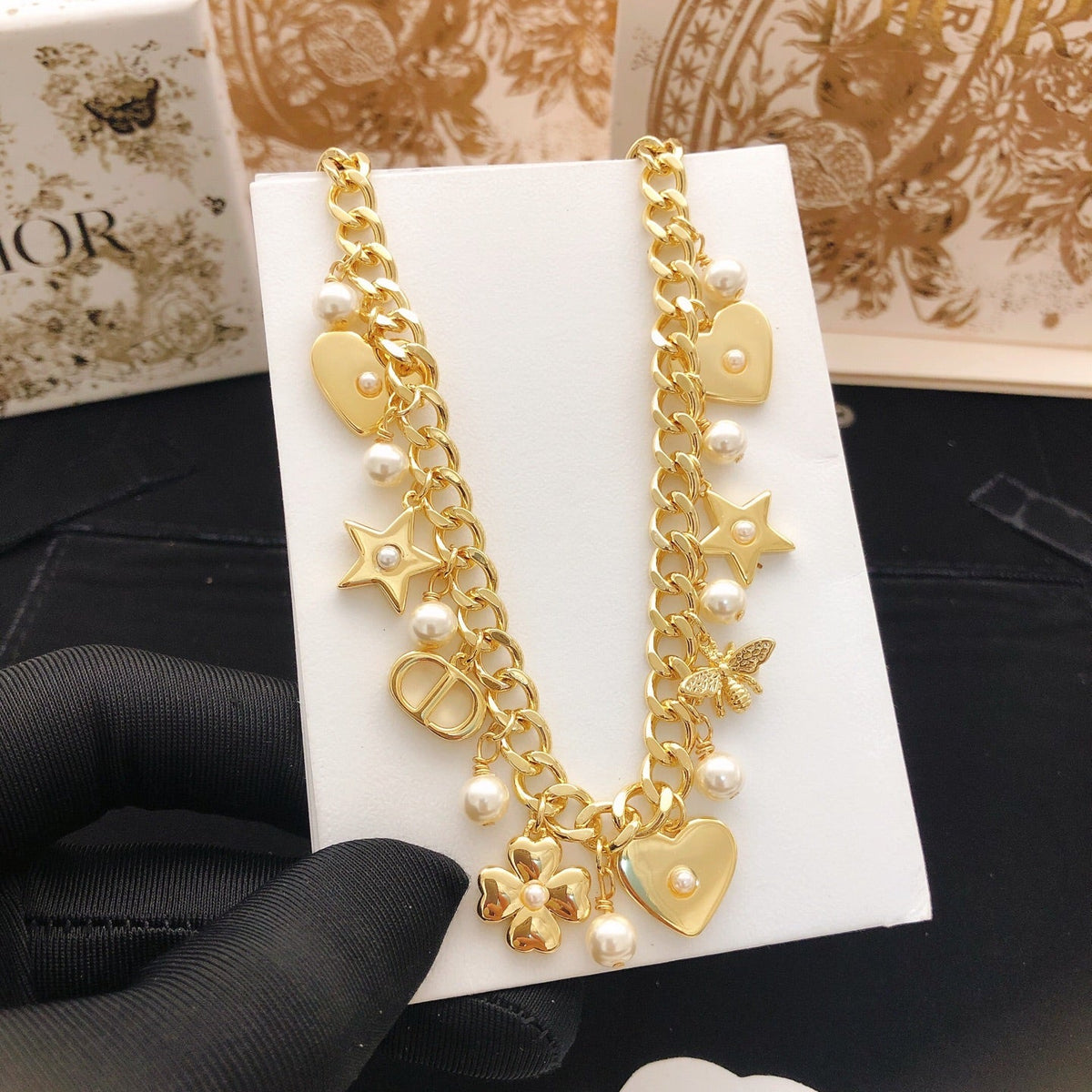 Martin Graham pendant necklace in polished metal-tone