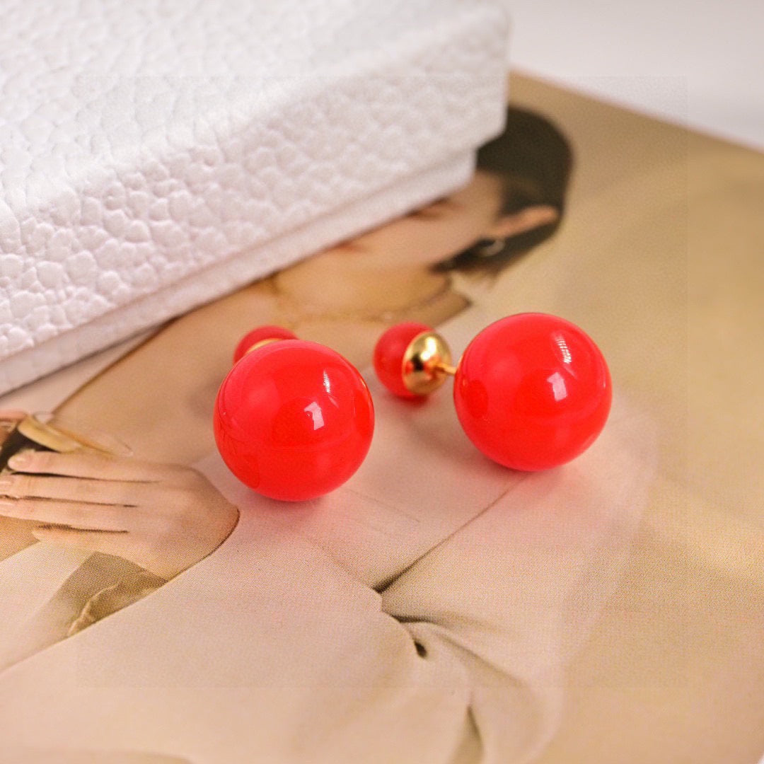 Martin Graham earrings in polished metal-tone