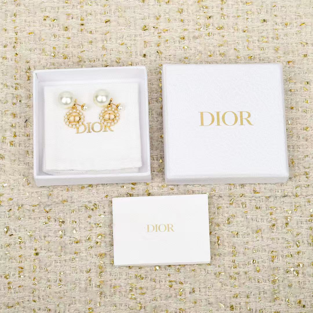 Martin Graham earrings in polished metal-tone