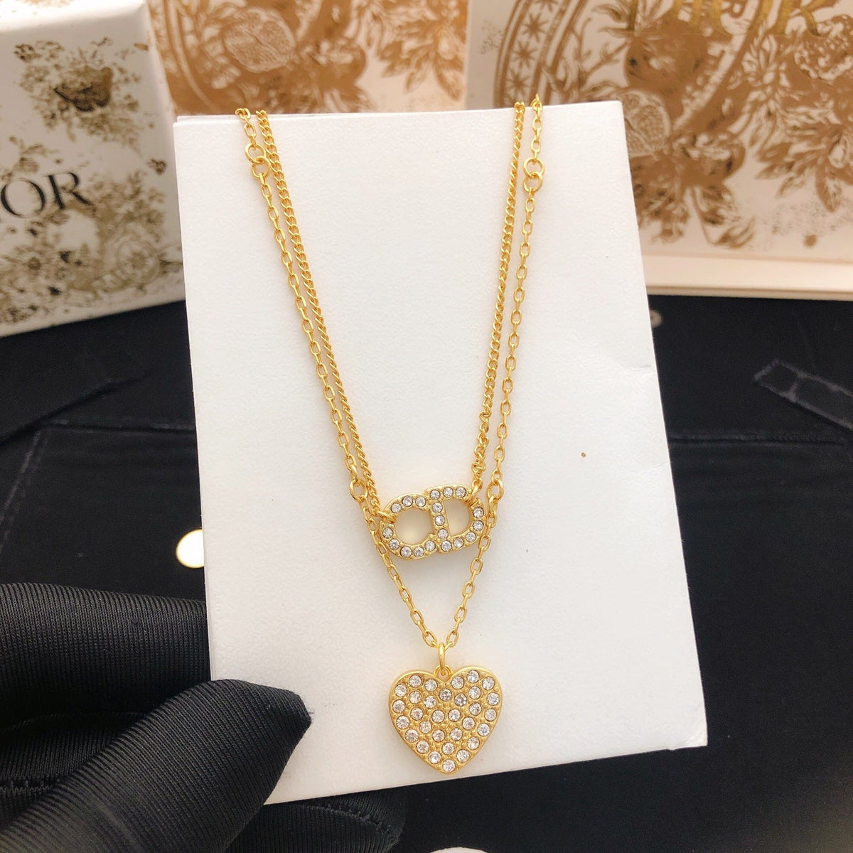Martin Graham pendant necklace in polished metal-tone