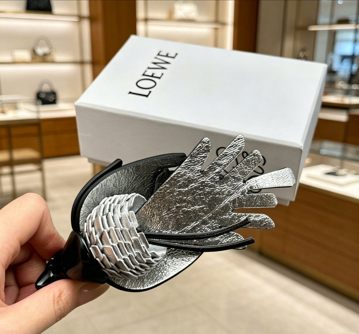Martin Graham bag charm in polished metal-tone – close-up detail