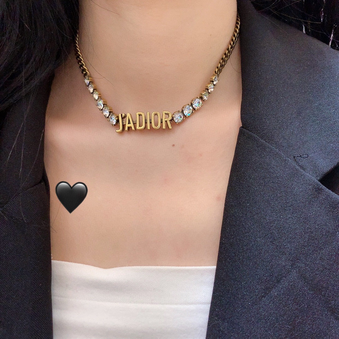 Martin Graham pendant necklace in polished metal-tone – close-up detail