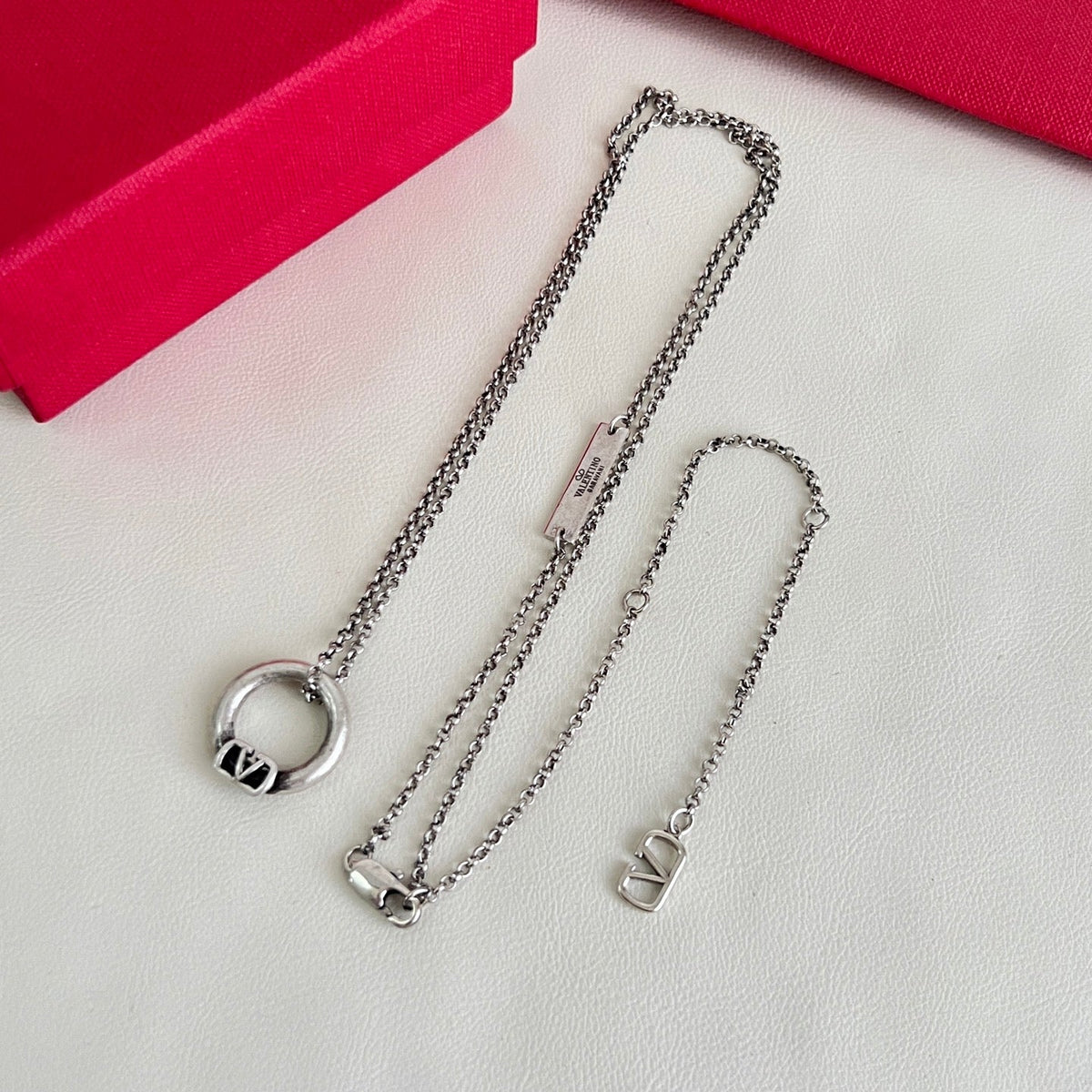 Martin Graham pendant necklace in polished metal-tone
