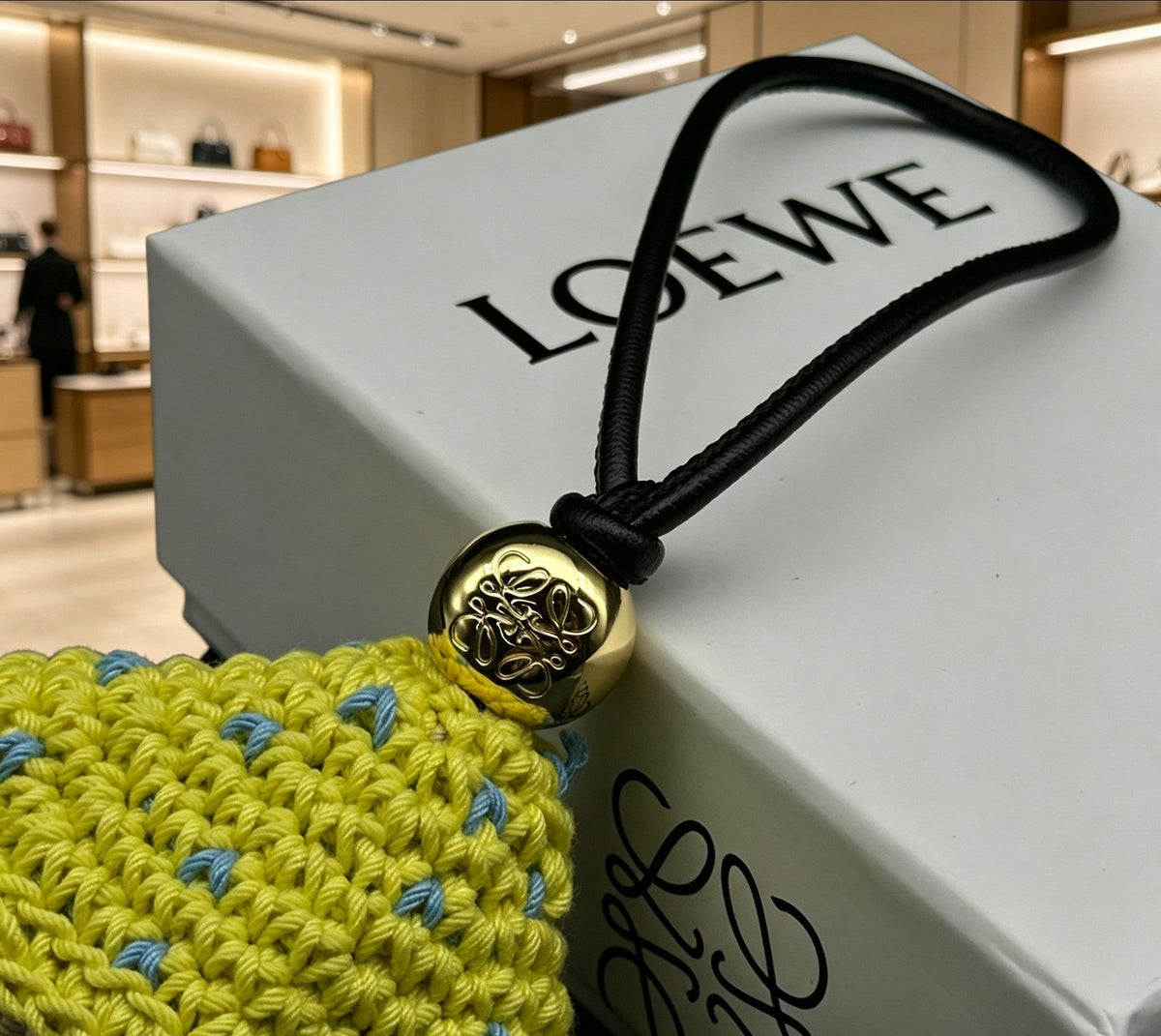 Martin Graham bag charm in polished metal-tone – close-up detail