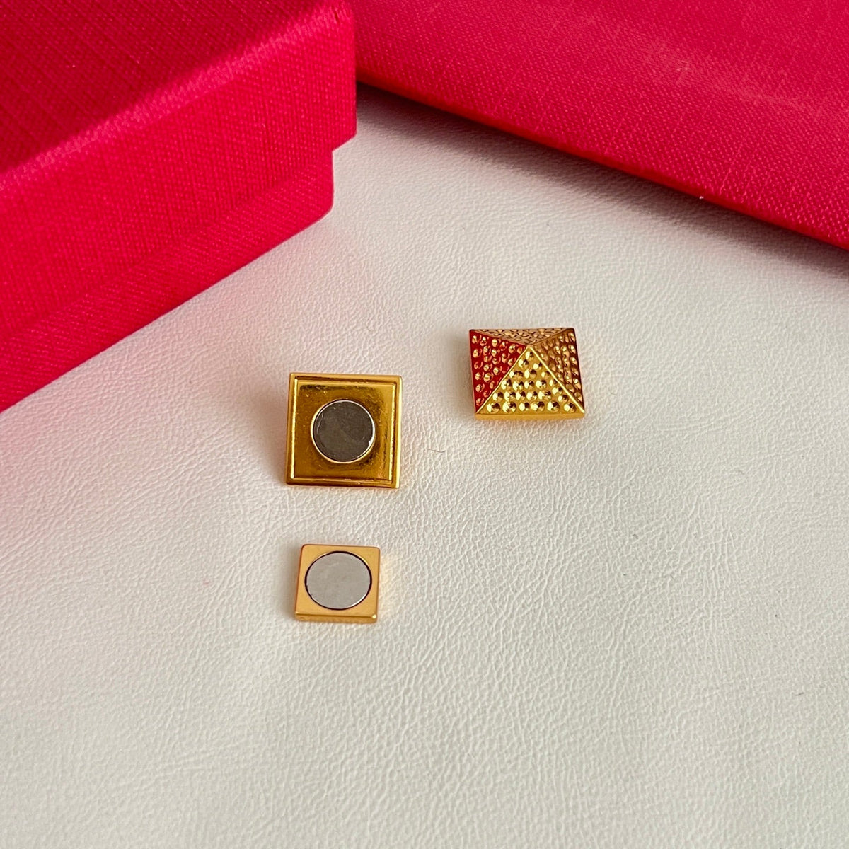 Martin Graham earrings in polished metal-tone