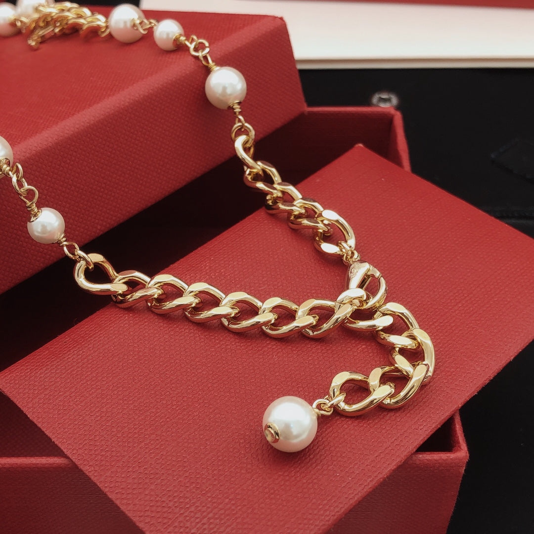Martin Graham pendant necklace in polished metal-tone – close-up detail