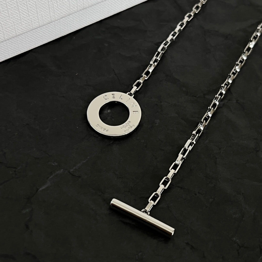 Martin Graham pendant necklace in polished metal-tone