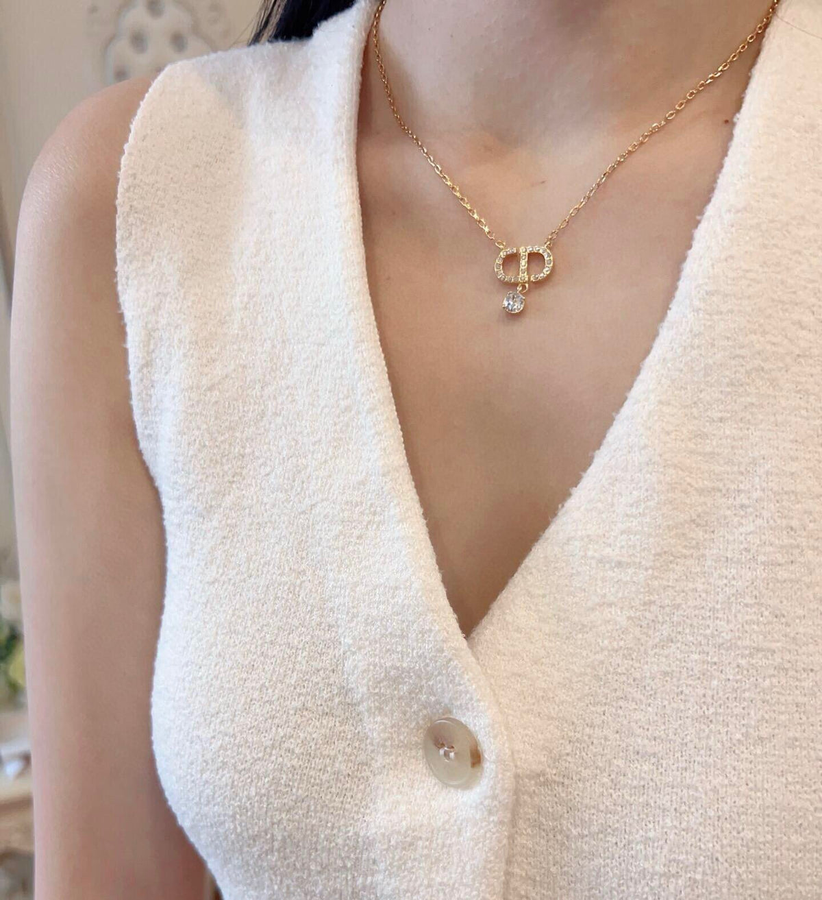 Martin Graham pendant necklace in polished metal-tone – close-up detail