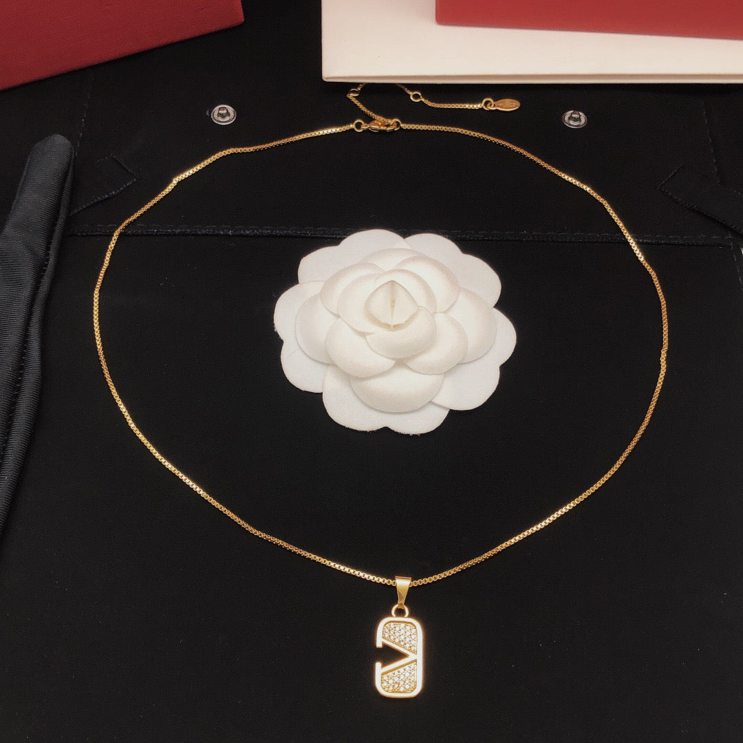 Martin Graham pendant necklace in polished metal-tone