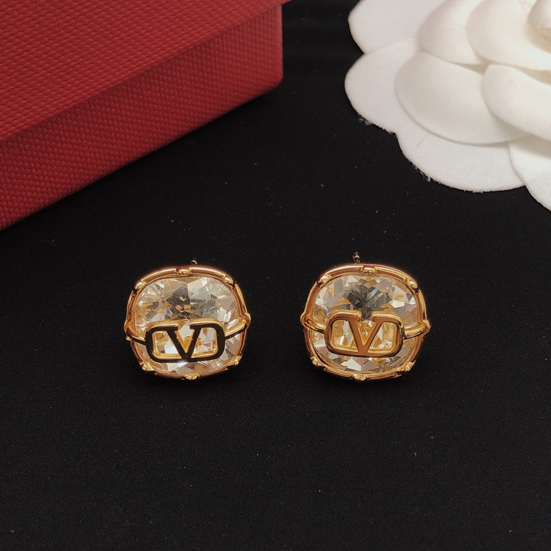 Martin Graham stud earrings in polished metal-tone – main product view