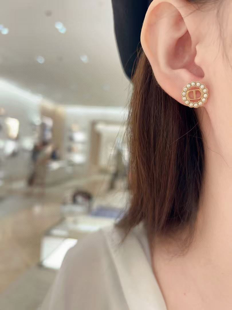 Martin Graham stud earrings in polished metal-tone – main product view