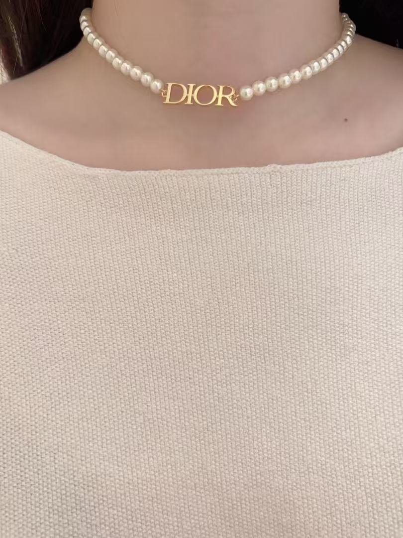 Martin Graham pendant necklace in polished metal-tone – front view