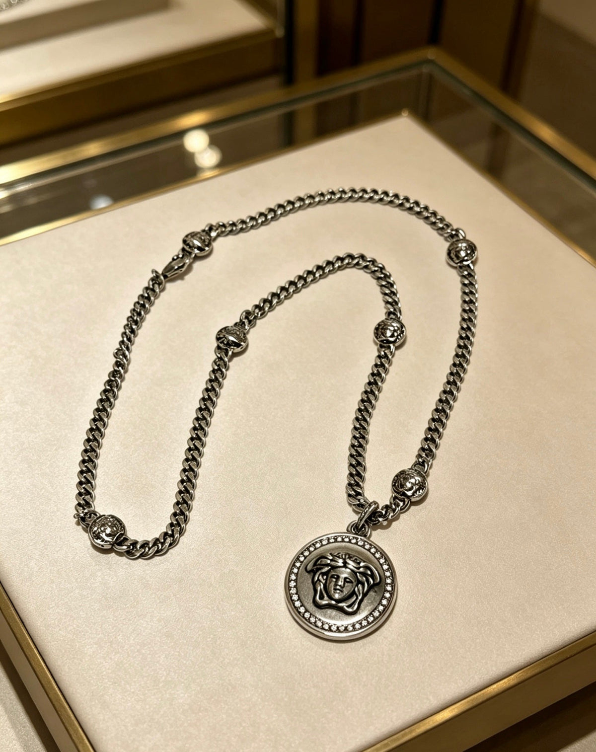 Martin Graham pendant necklace in polished metal-tone – front product view