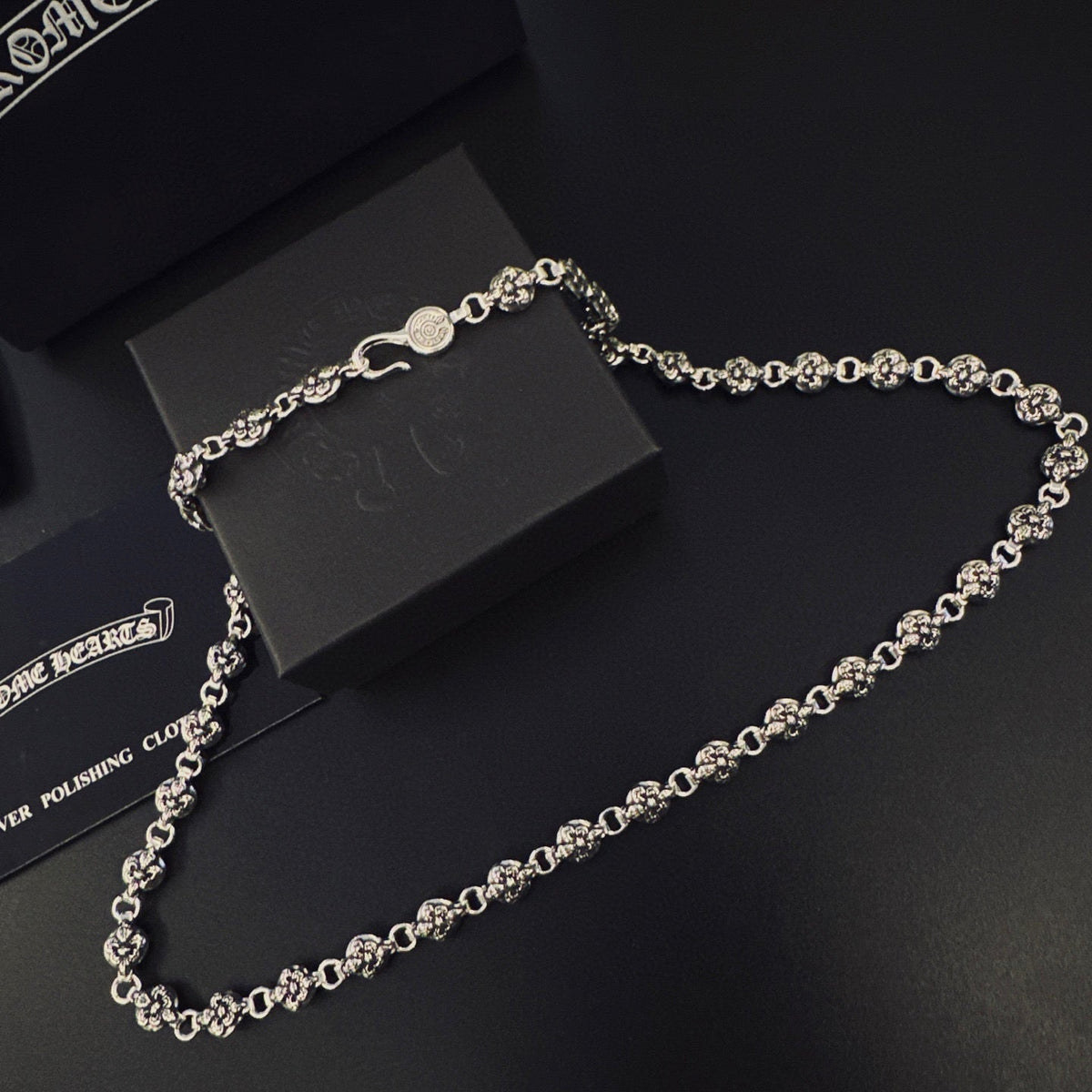 Martin Graham pendant necklace in polished metal-tone – front product view