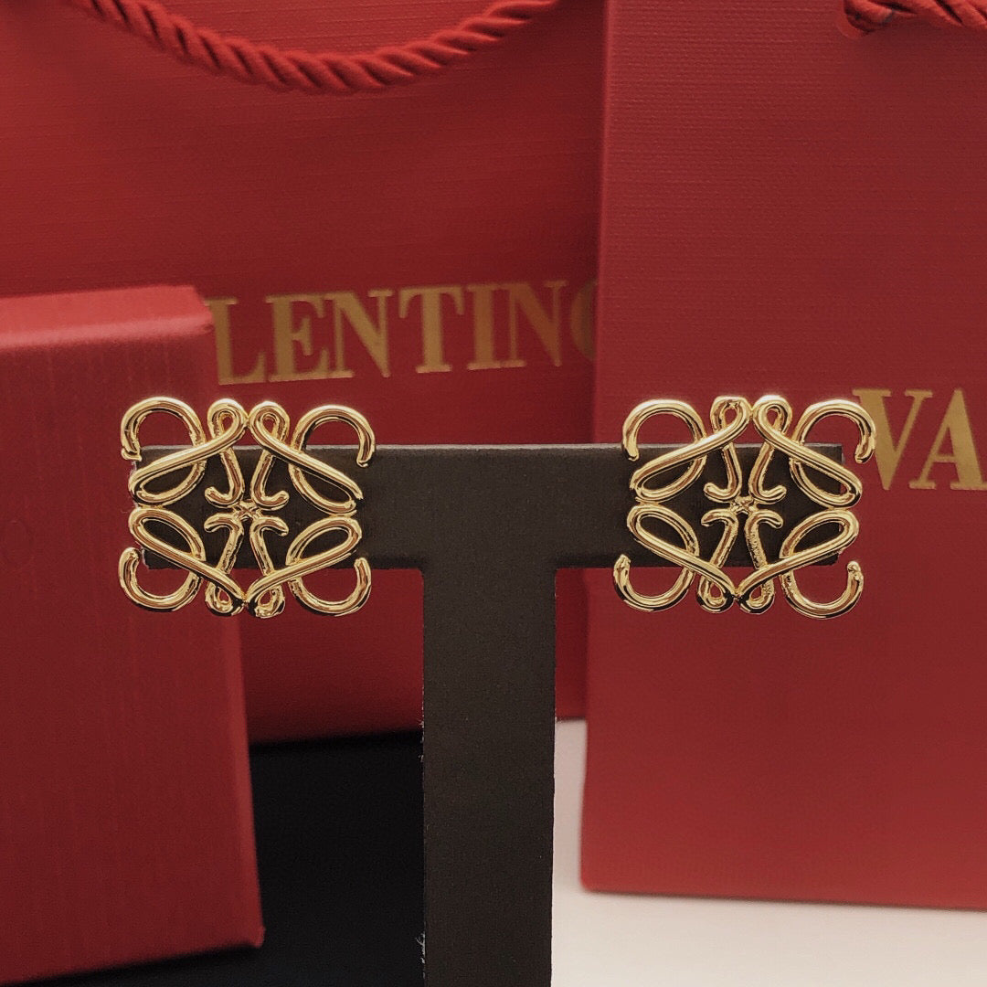 Martin Graham stud earrings in polished metal-tone – front view