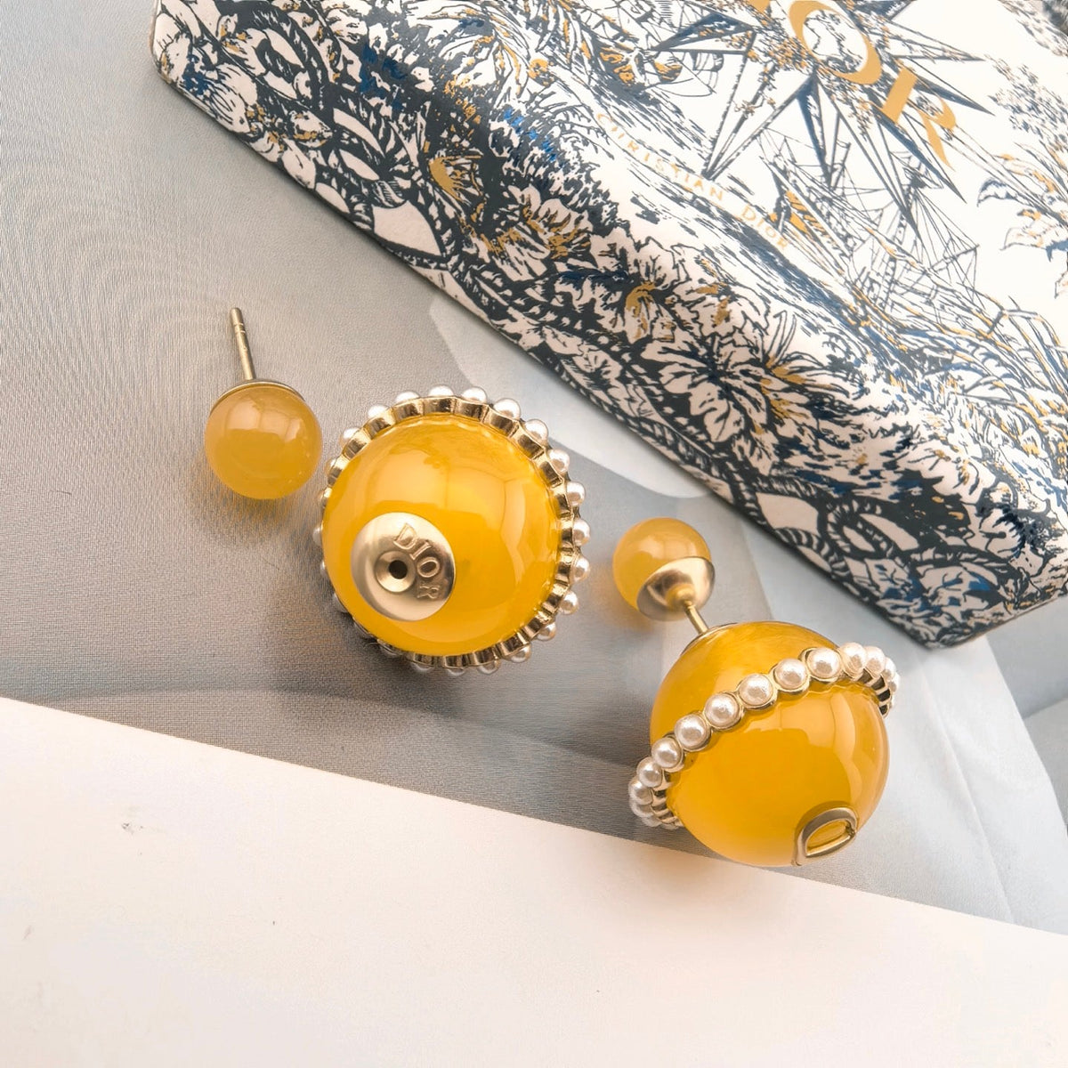 Martin Graham earrings in polished metal-tone – front view