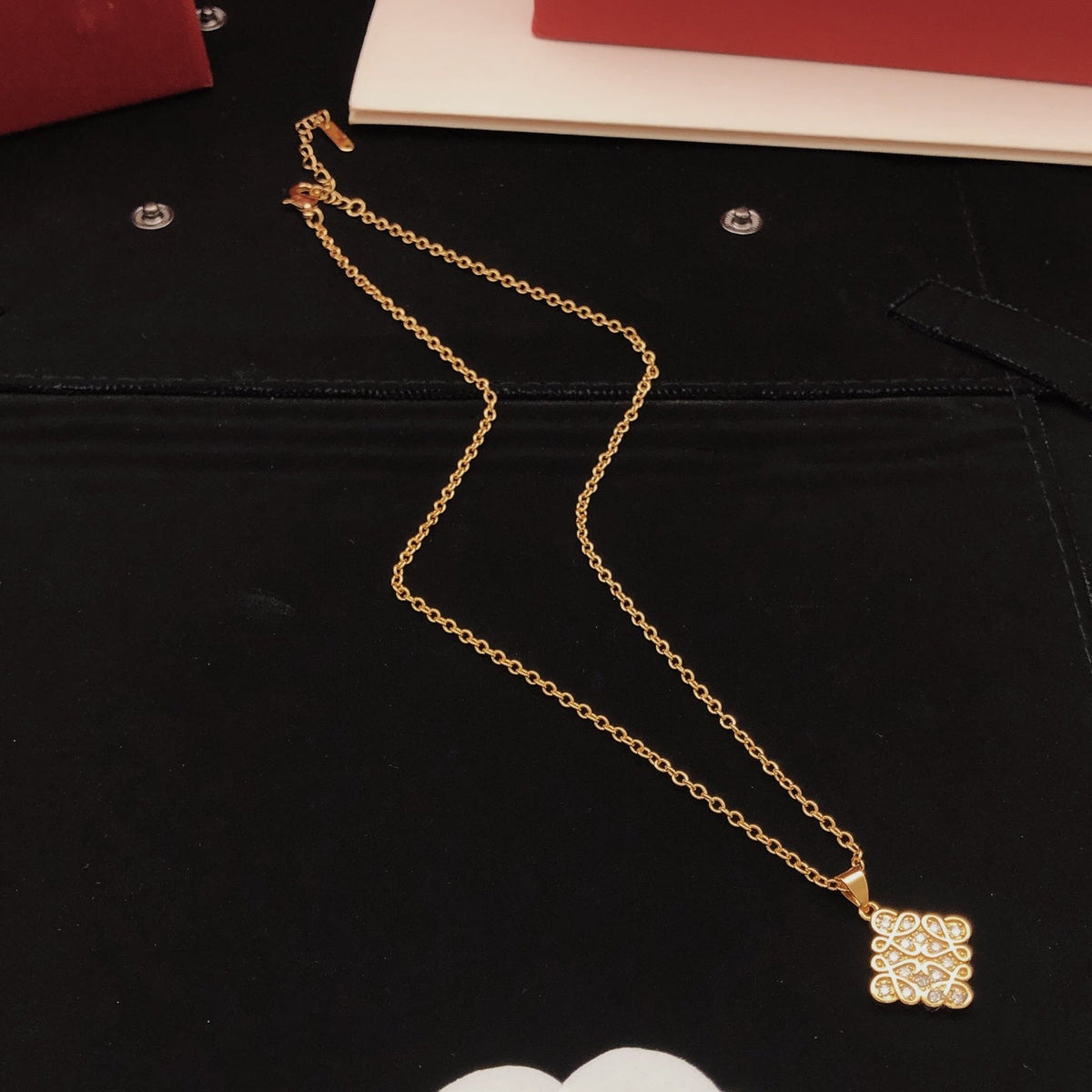 Martin Graham pendant necklace in polished metal-tone – front view