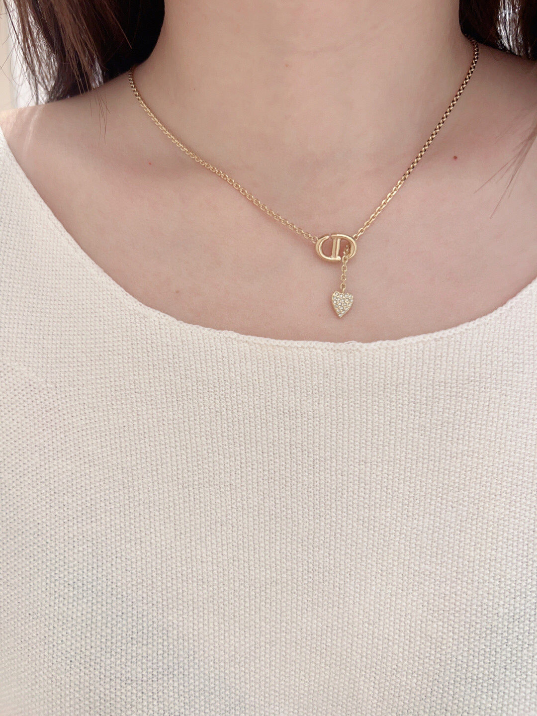 Martin Graham pendant necklace in polished metal-tone – front view