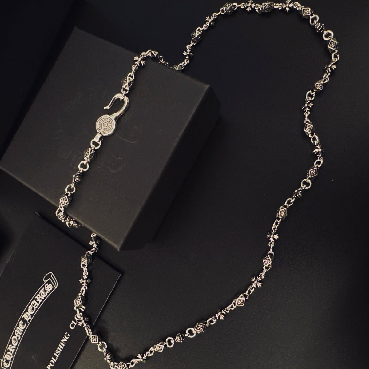 Martin Graham pendant necklace in polished metal-tone – front product view