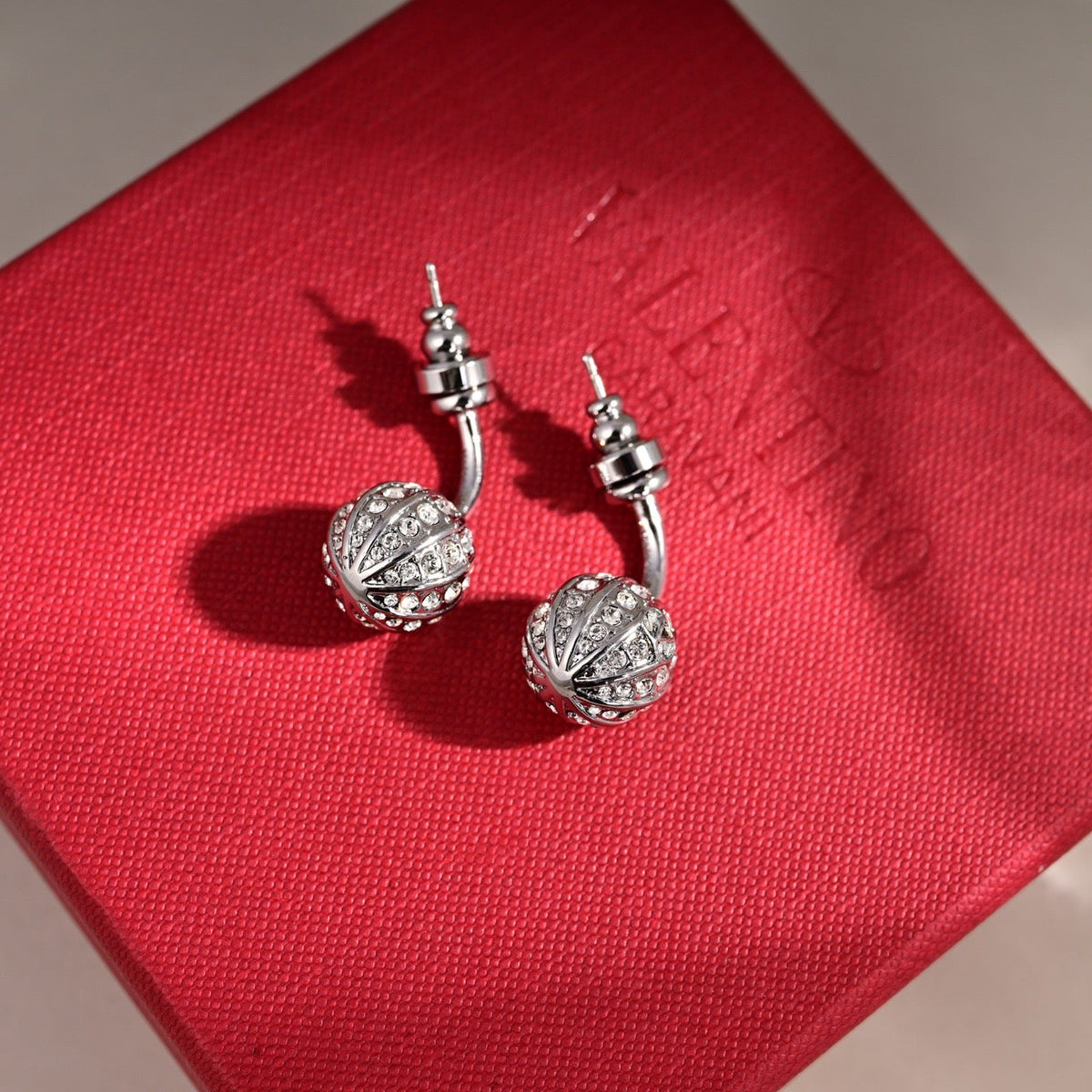 Martin Graham earrings in polished metal-tone – front view
