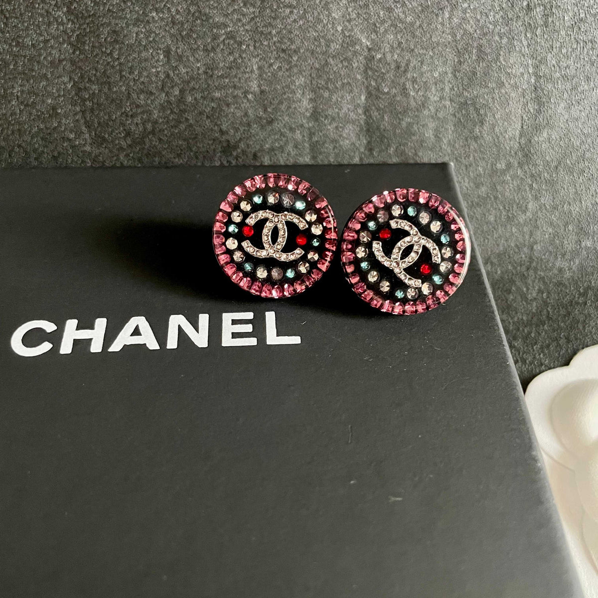 Martin Graham stud earrings in polished metal-tone – detail view