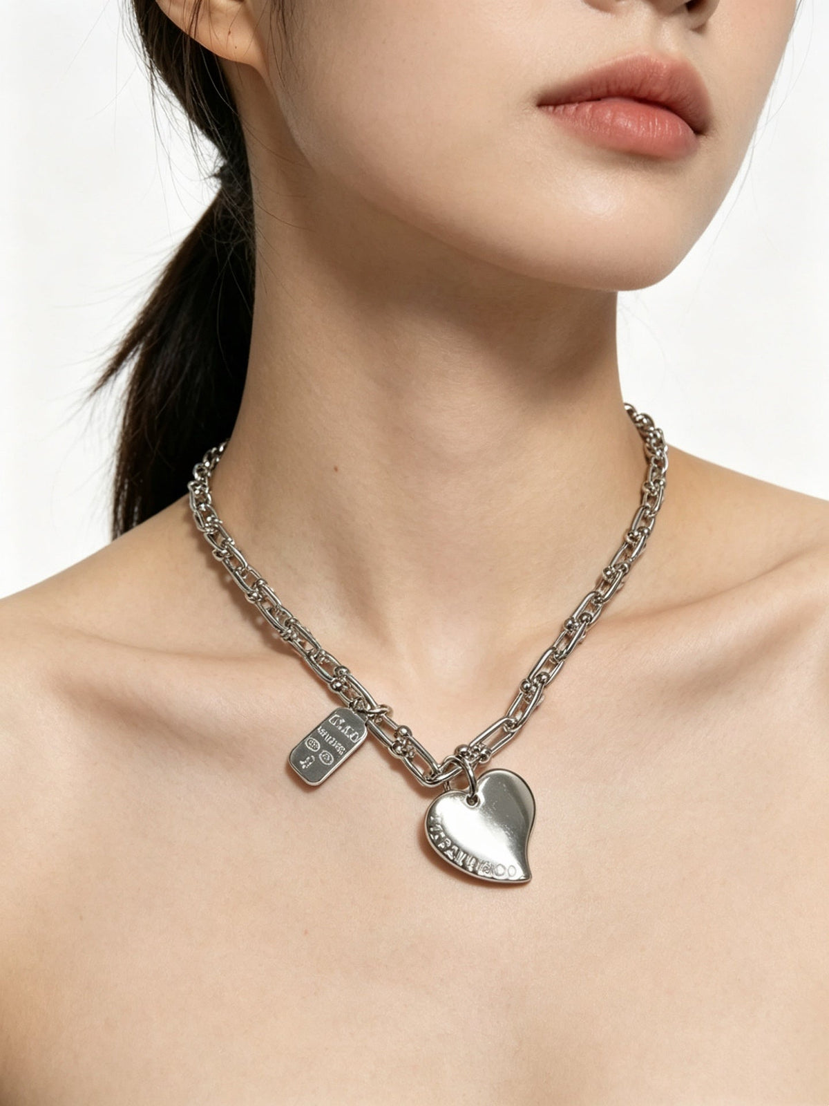 Martin Graham pendant necklace in polished metal-tone – detail view