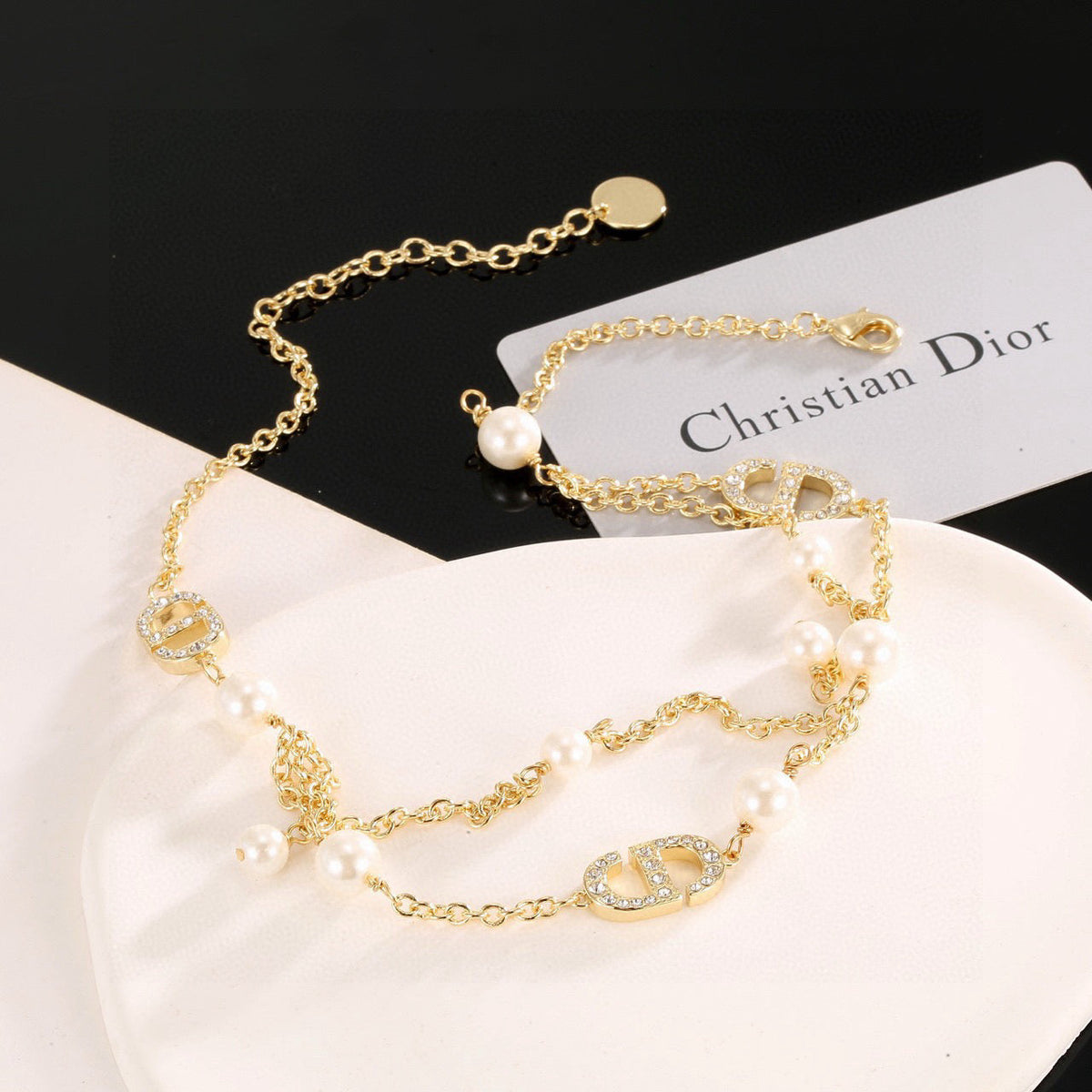 Martin Graham pendant necklace in polished metal-tone – detail view