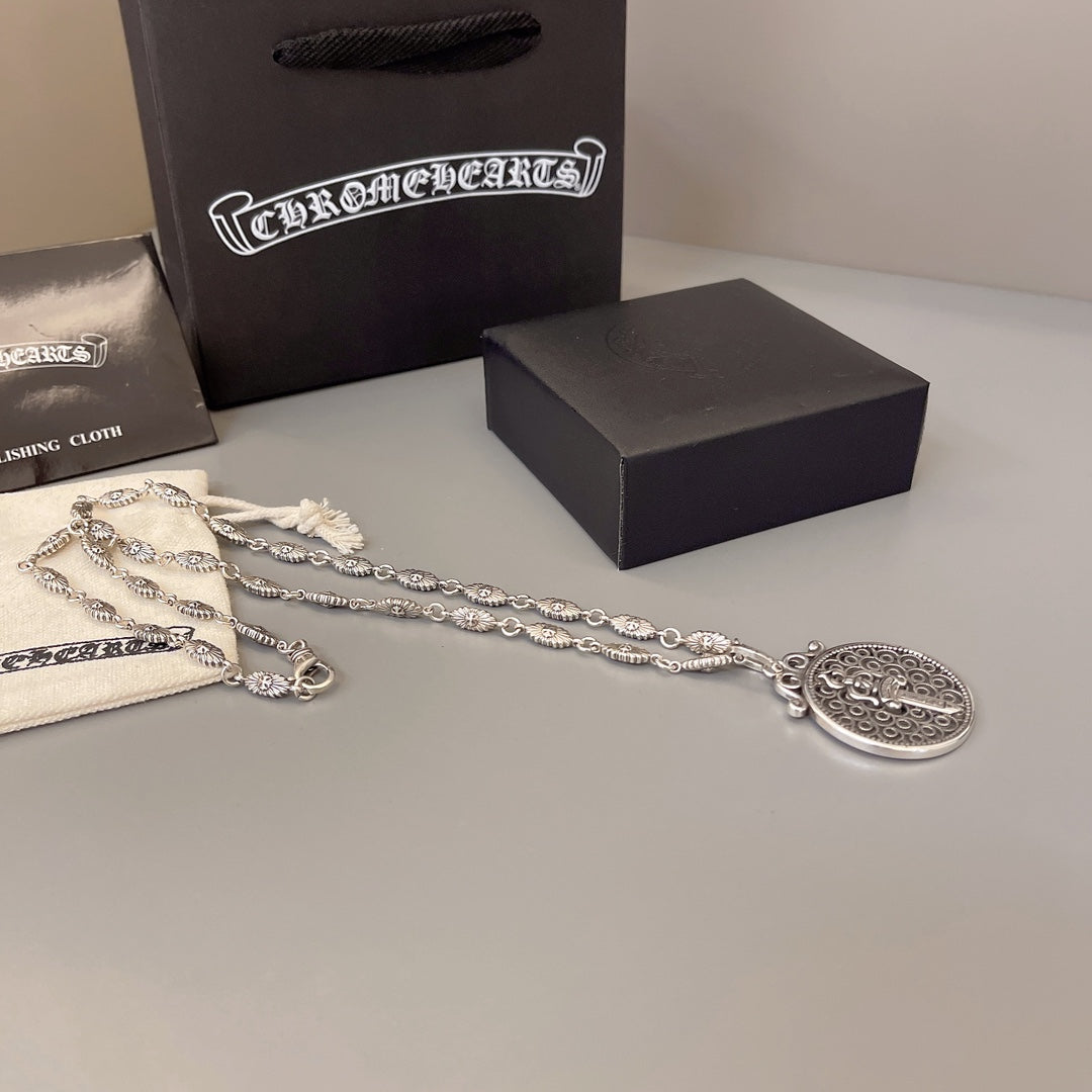 Martin Graham pendant necklace in polished metal-tone – detail view