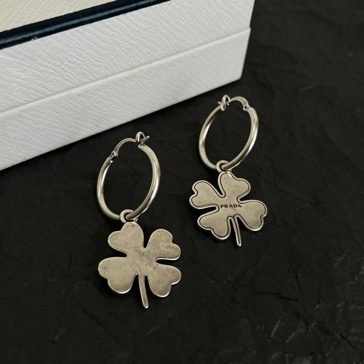 Martin Graham earrings in polished metal-tone – detail view