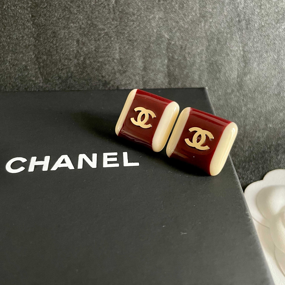 Martin Graham stud earrings in polished metal-tone – detail view