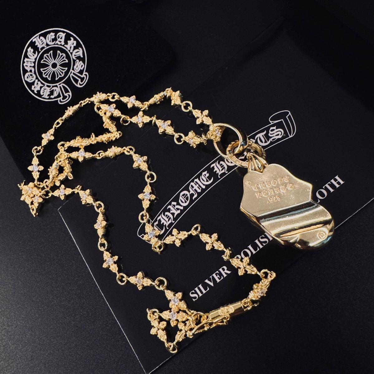 Martin Graham pendant necklace in polished metal-tone – detail view