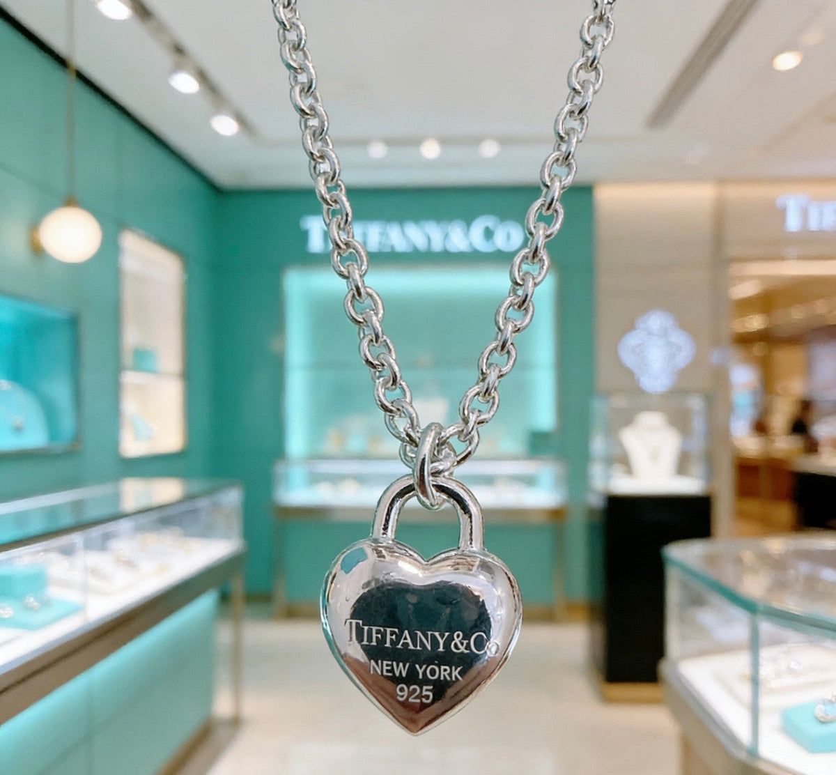 Martin Graham pendant necklace in polished metal-tone – detail view