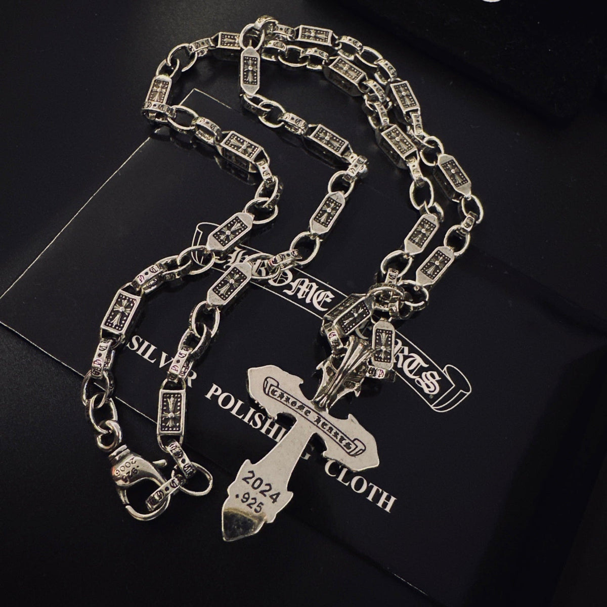 Martin Graham pendant necklace in polished metal-tone – detail view