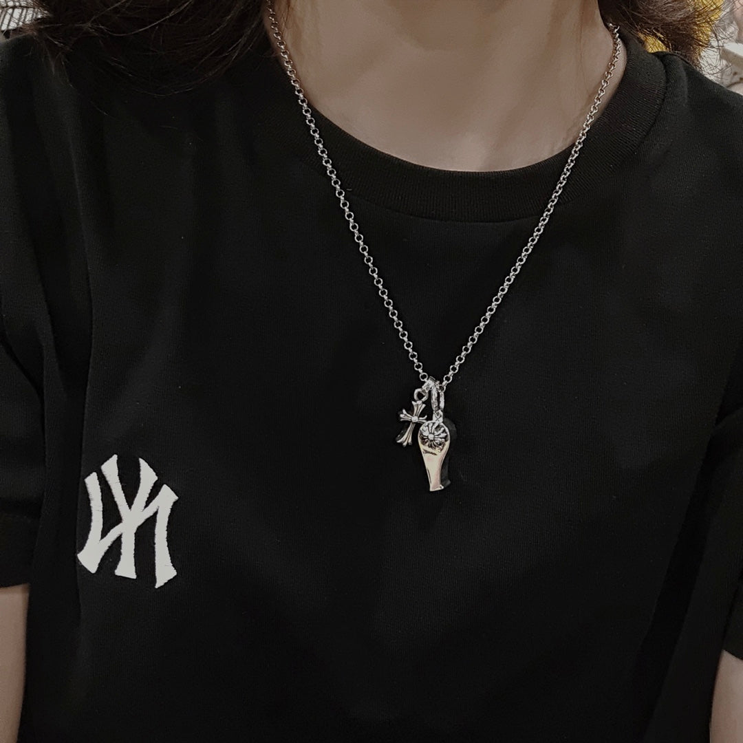Martin Graham pendant necklace in polished metal-tone – detail view