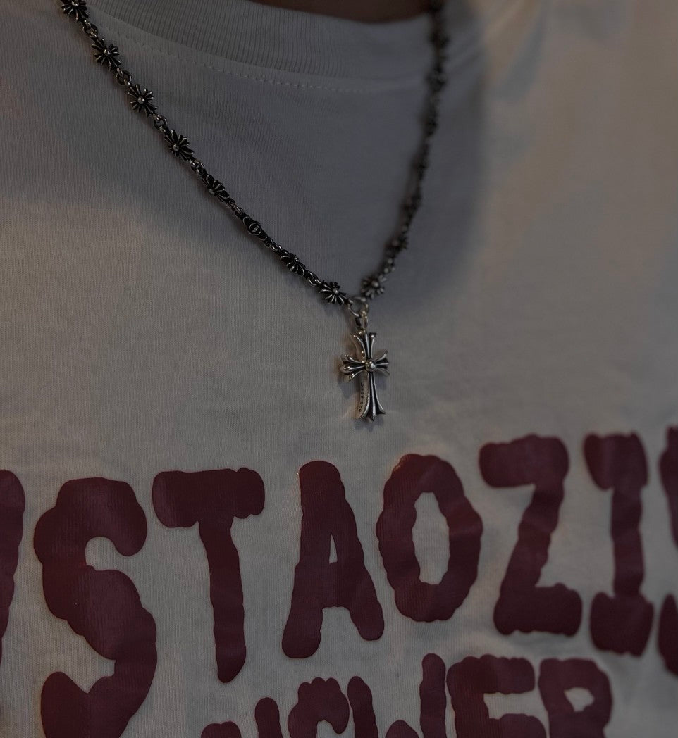 Martin Graham pendant necklace in polished metal-tone – detail view