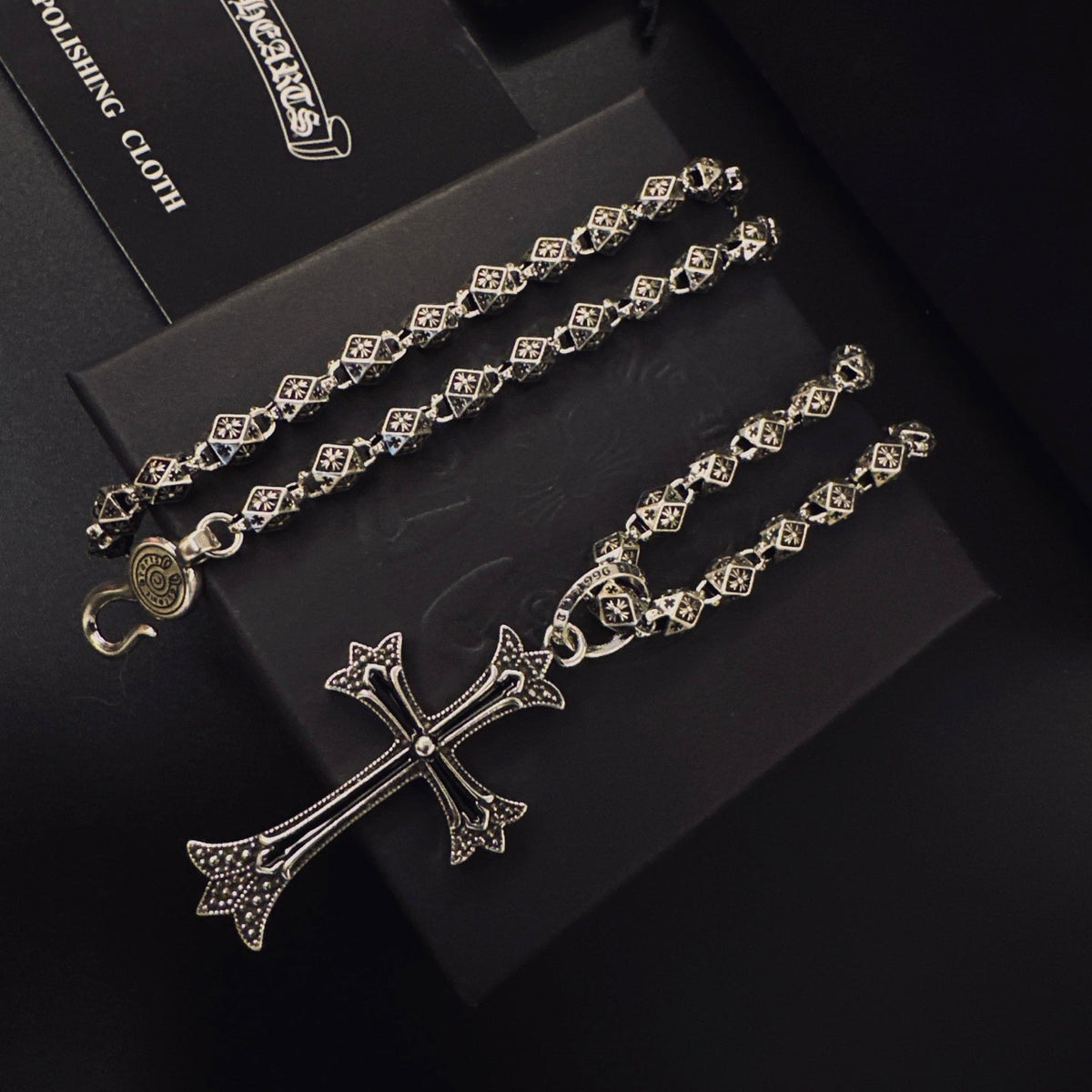 Martin Graham pendant necklace in polished metal-tone – detail view