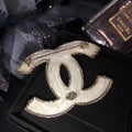 Signature Emblem Brooch in Polished Metal-Tone – Design 039 main product view