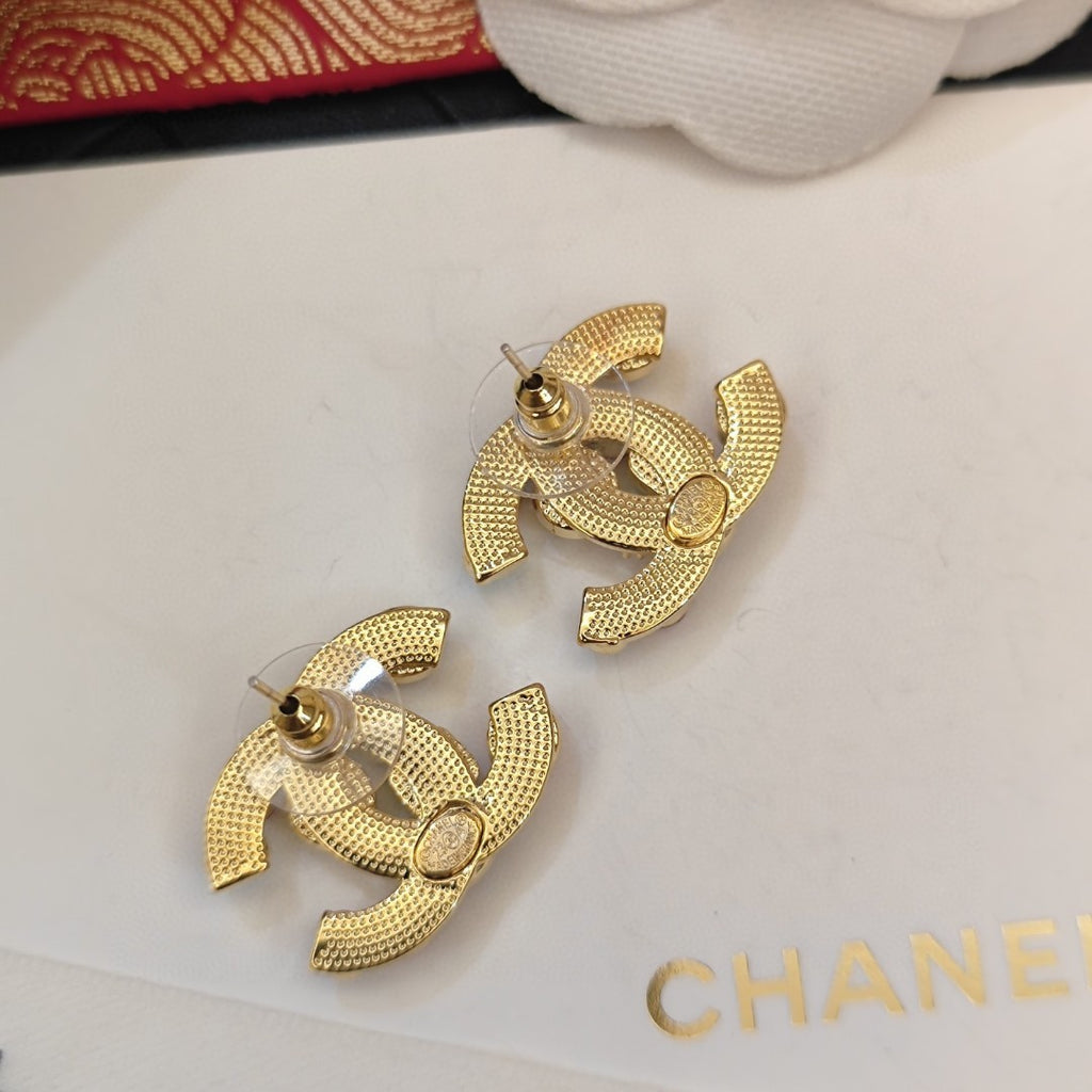 Double-C Emblem Pearl-Detail Stud Earrings – Pearl Detail – Design 021 close-up detail