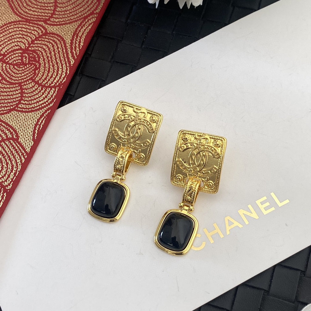 Letter Stud Earrings in Silver-Tone – Black Detail front product view