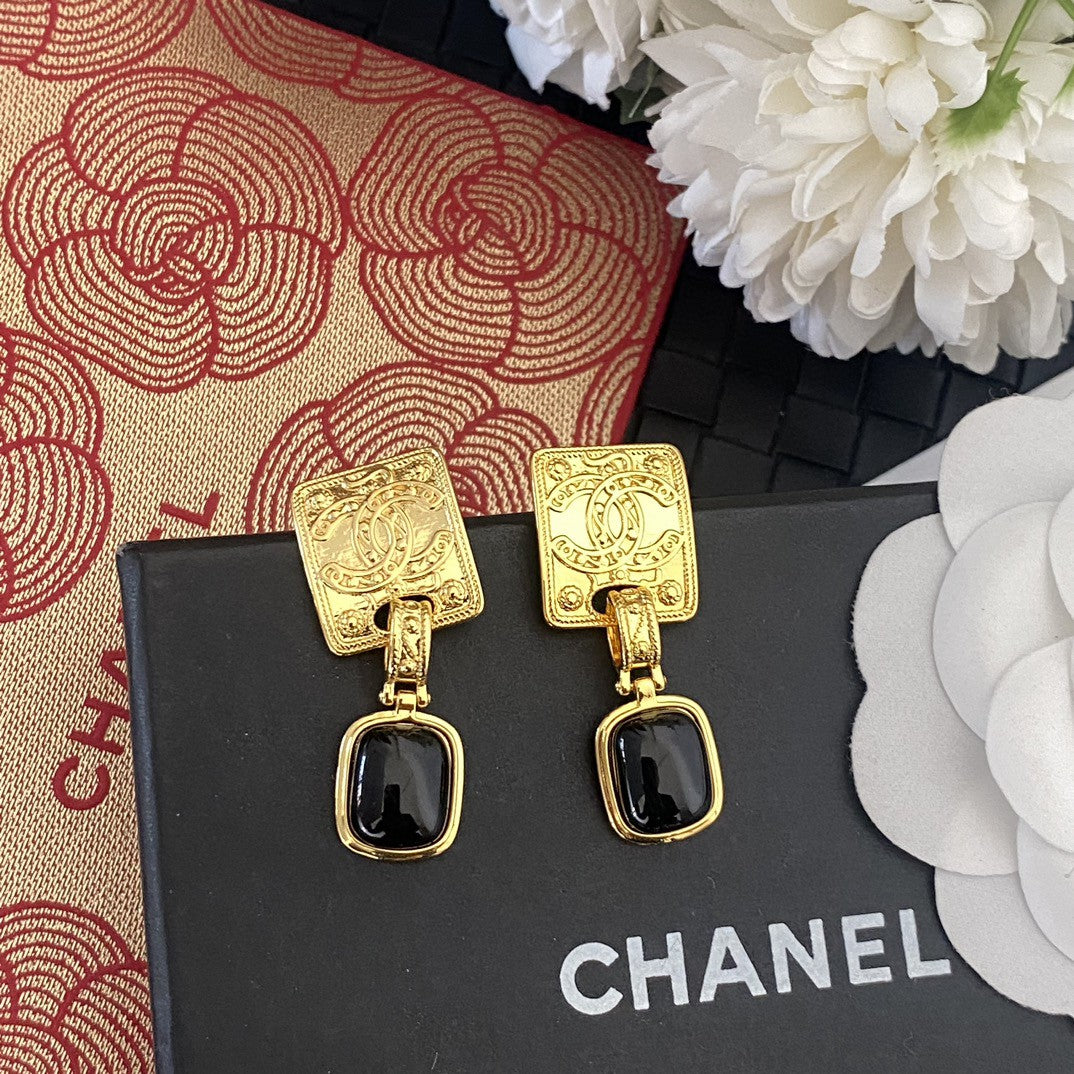 Letter Stud Earrings in Silver-Tone – Black Detail main product view
