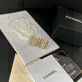 Double-C Emblem Stud Earrings in Polished Metal-Tone – Design 036 main product view