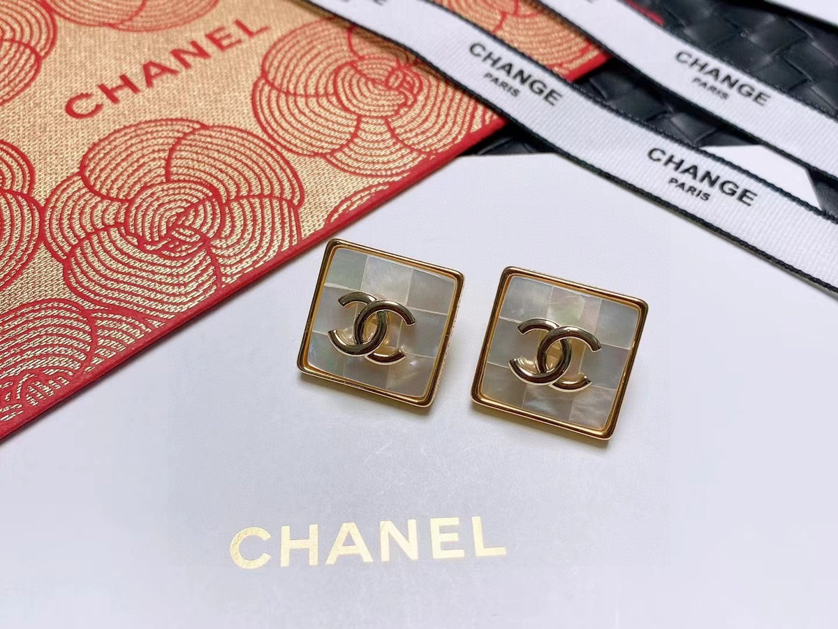 Signature Emblem Stud Earrings in Polished Metal-Tone – Design 012 close-up detail