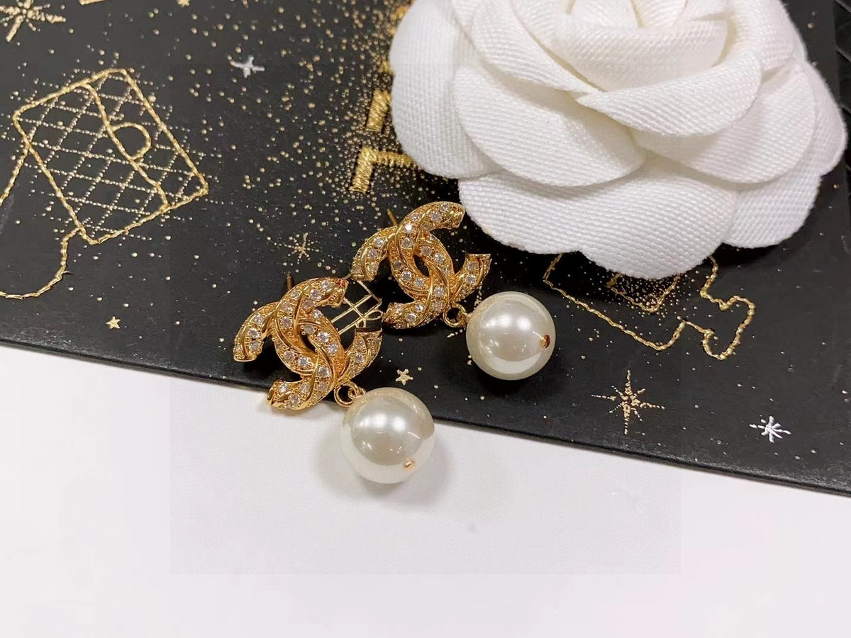 Double-C Emblem Stud Earrings in Polished Metal-Tone – Design 481 front product view
