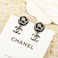 Double-C Emblem Stud Earrings in Polished Metal-Tone – Design 480 main product view