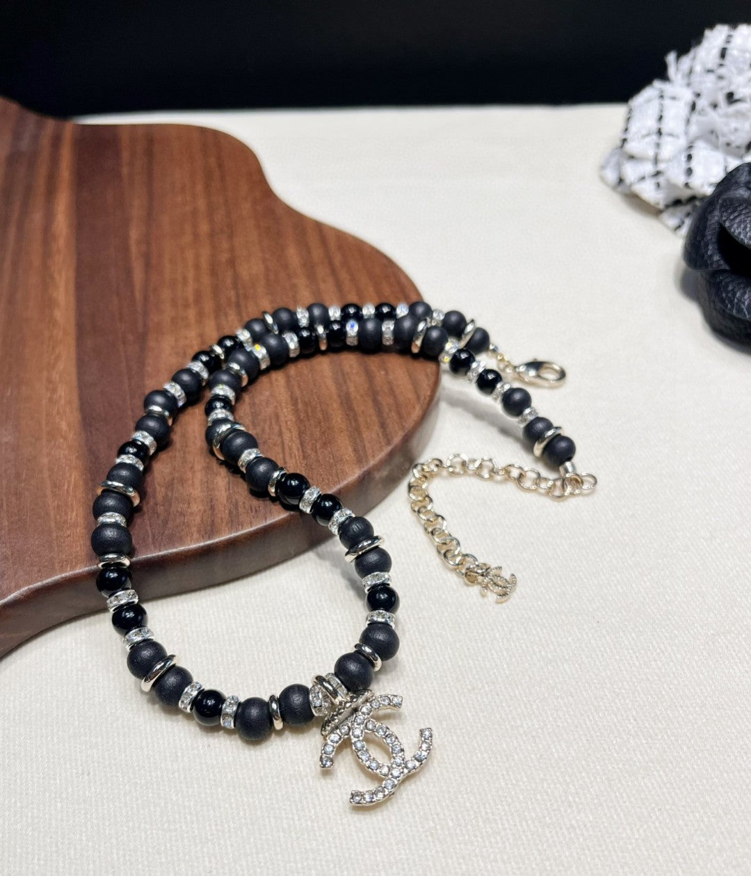 Signature Emblem Pendant Necklace in Polished Metal-Tone – Black Detail – Design 003 styled product view
