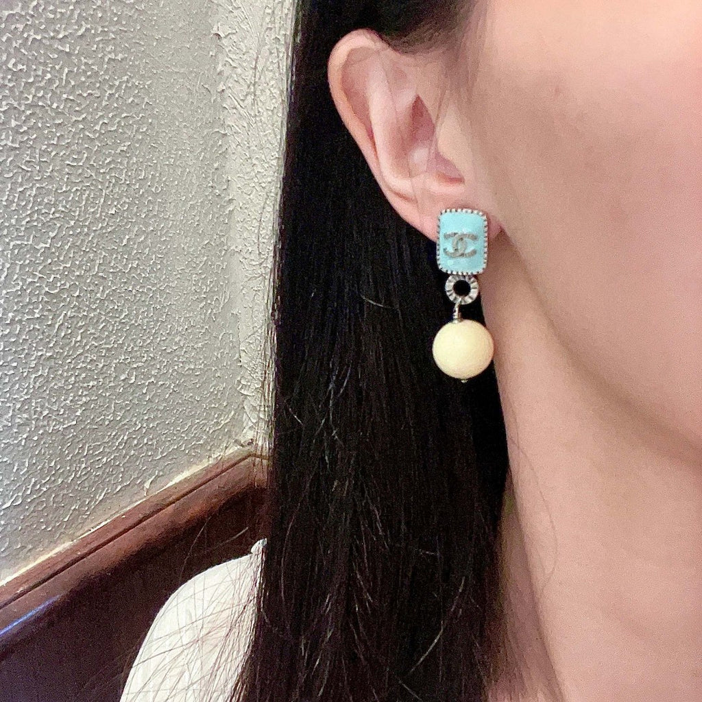 Double-C Emblem Pearl-Detail Statement Earrings – Pearl Detail – Design 030 detail view